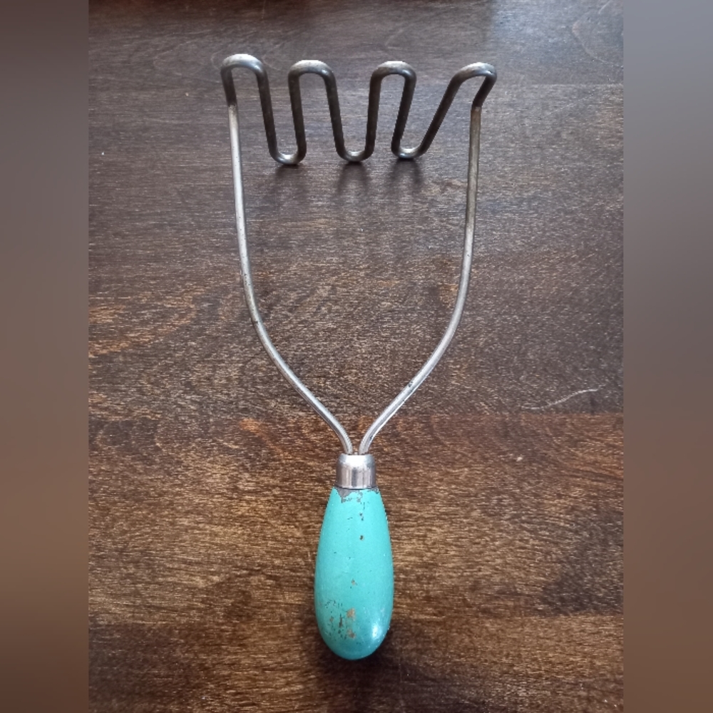 Chippy green paint potato masher